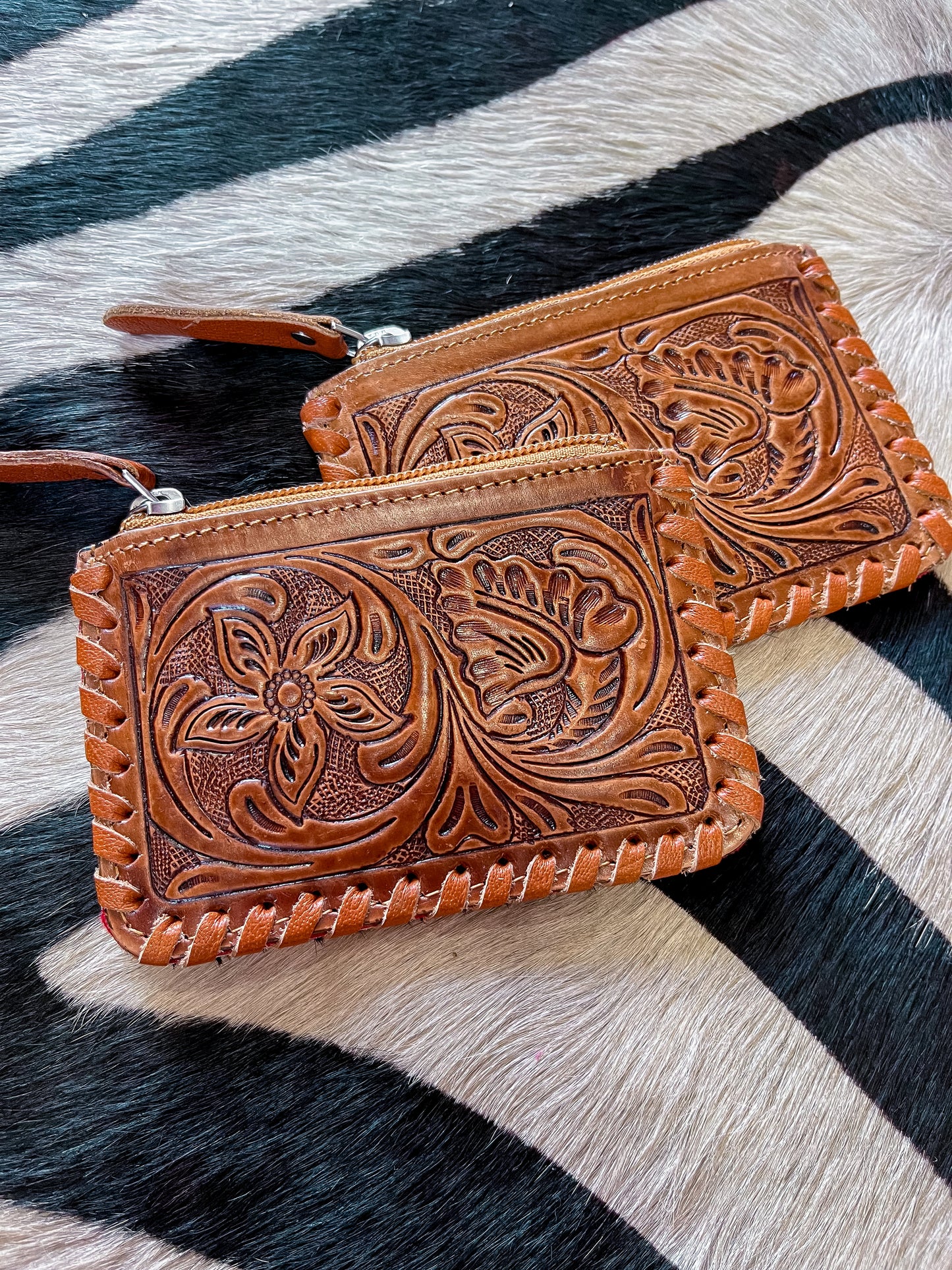 The Tooled Cowhide Zipper Wallets