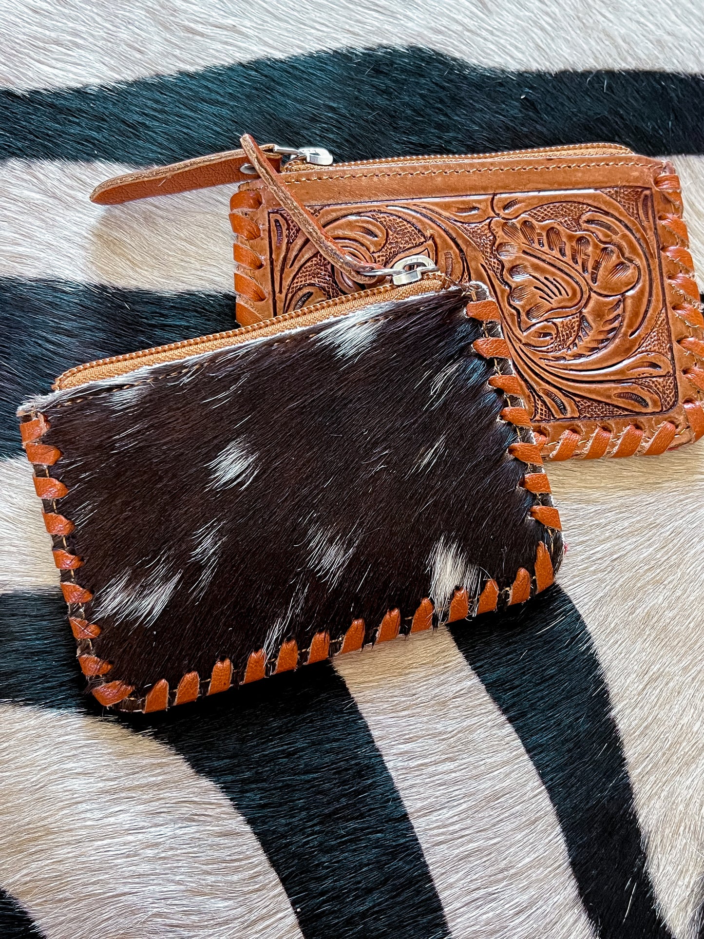The Tooled Cowhide Zipper Wallets