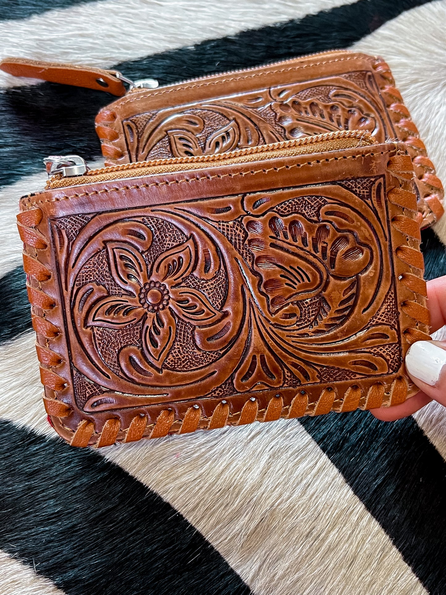 The Tooled Cowhide Zipper Wallets