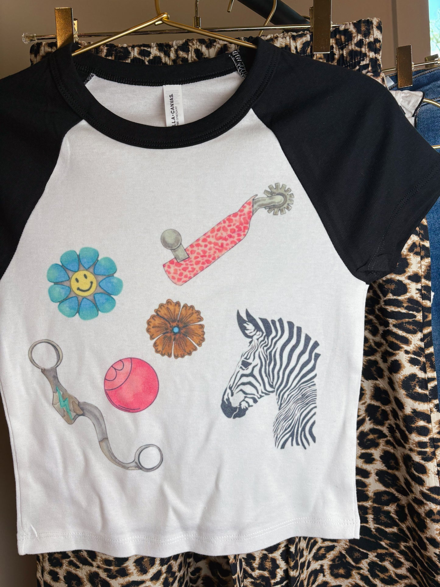 The Cowgirl Trinkets Baby Tee