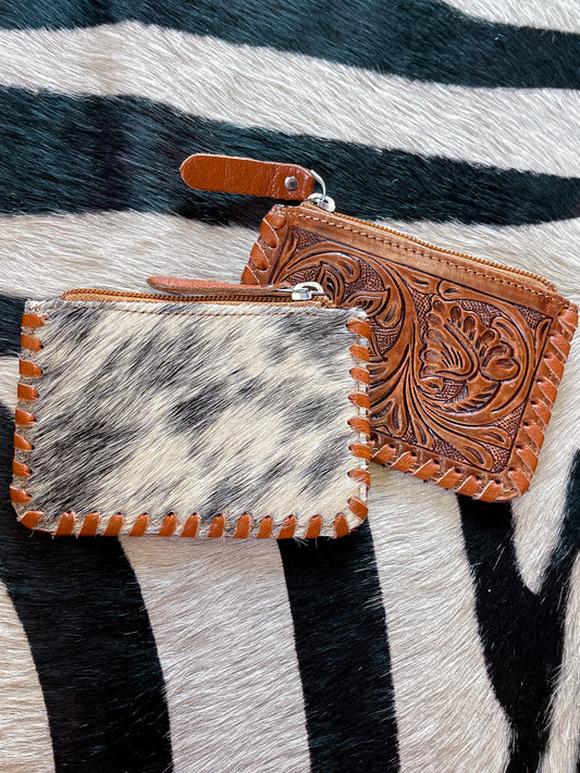 The Tooled Cowhide Zipper Wallets